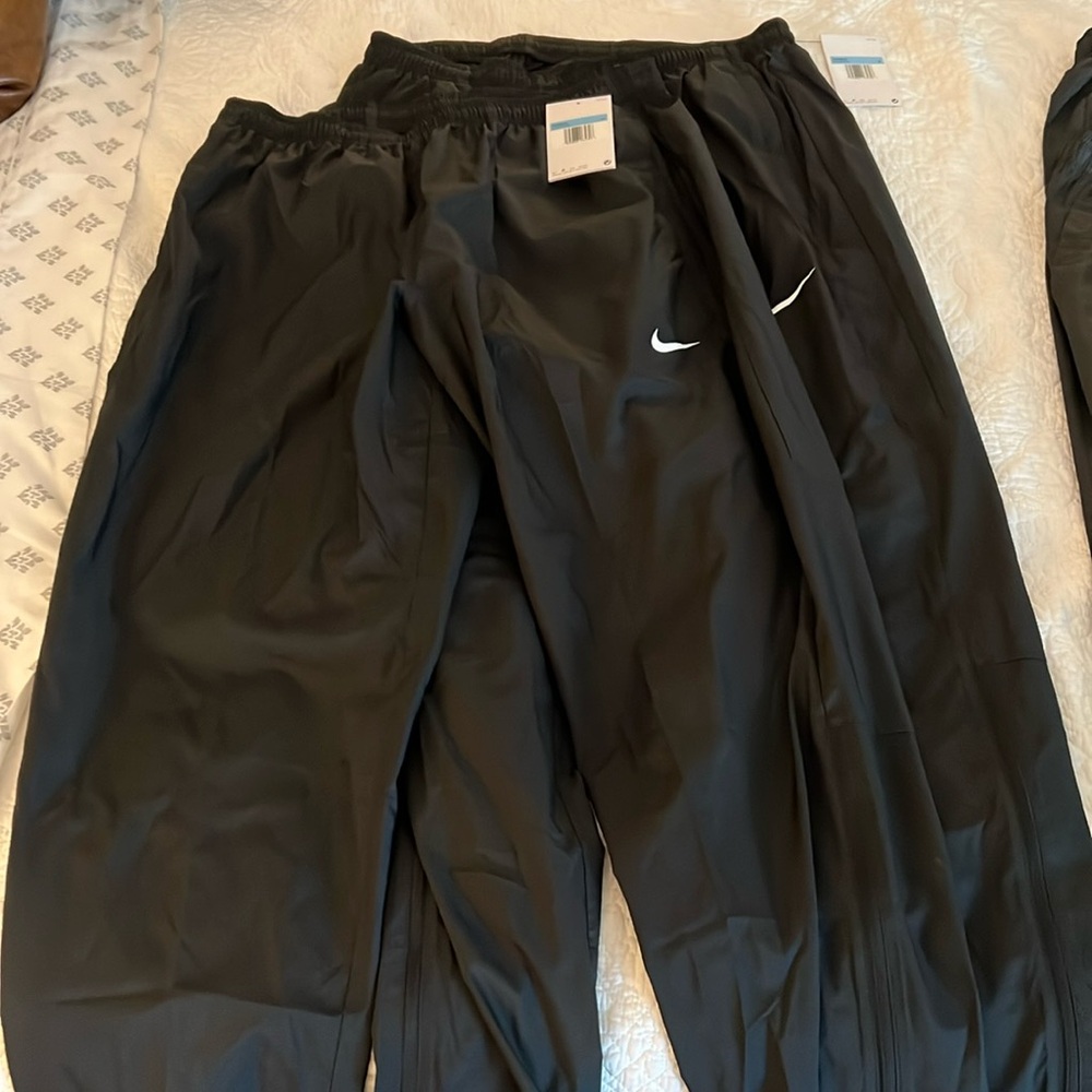 Women’s parachute joggers. Two pair new with tags.